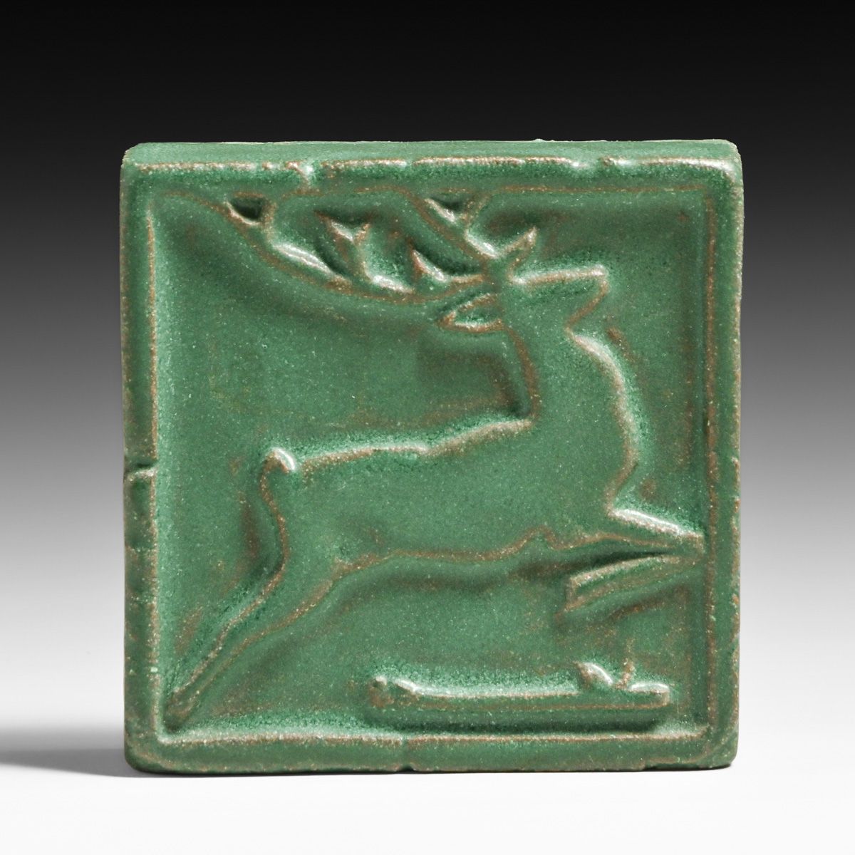 Grueby Pottery Matte Green Galloping Deer Tile c1910