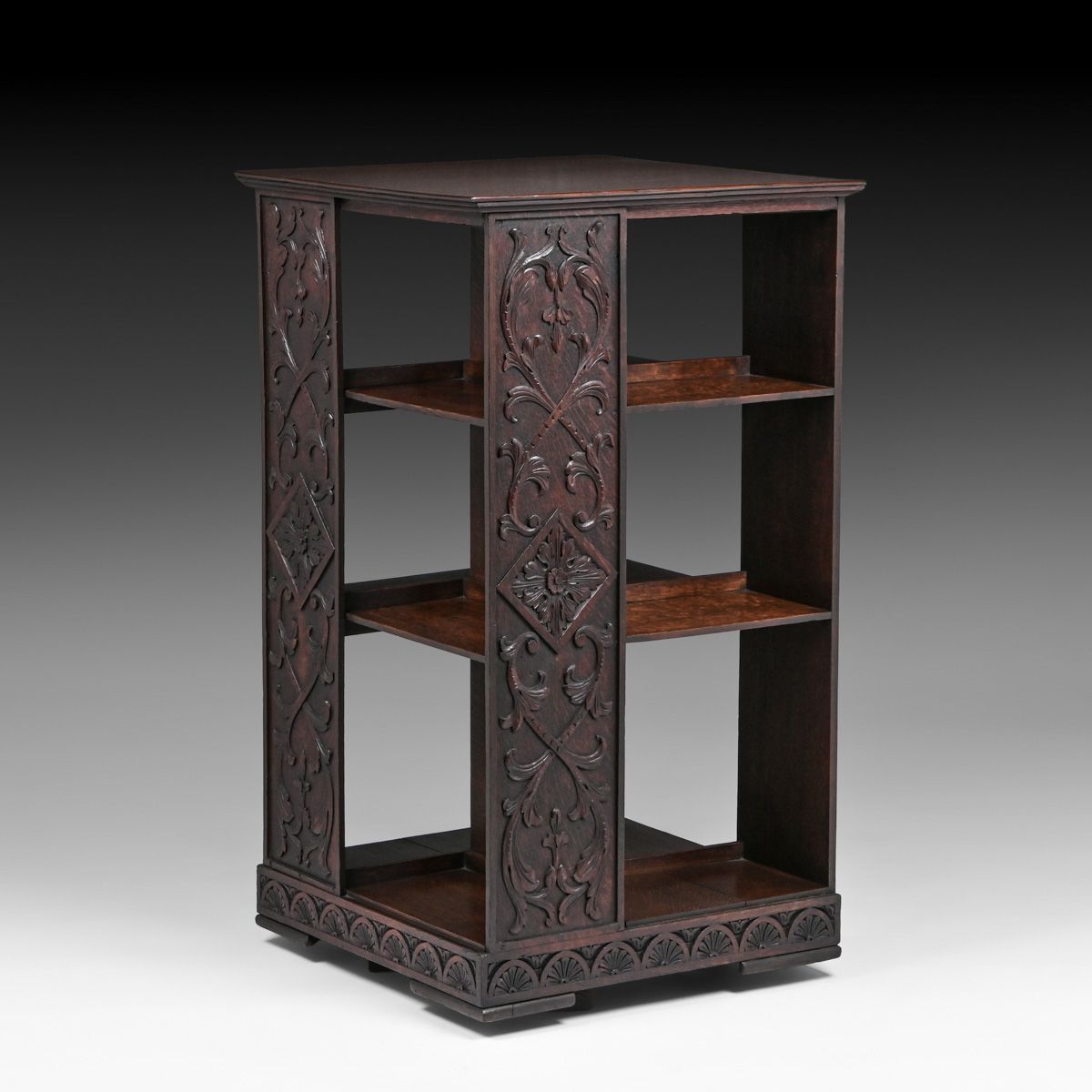 American Renaissance Revival Carved Oak Revolving Bookcase c1890s