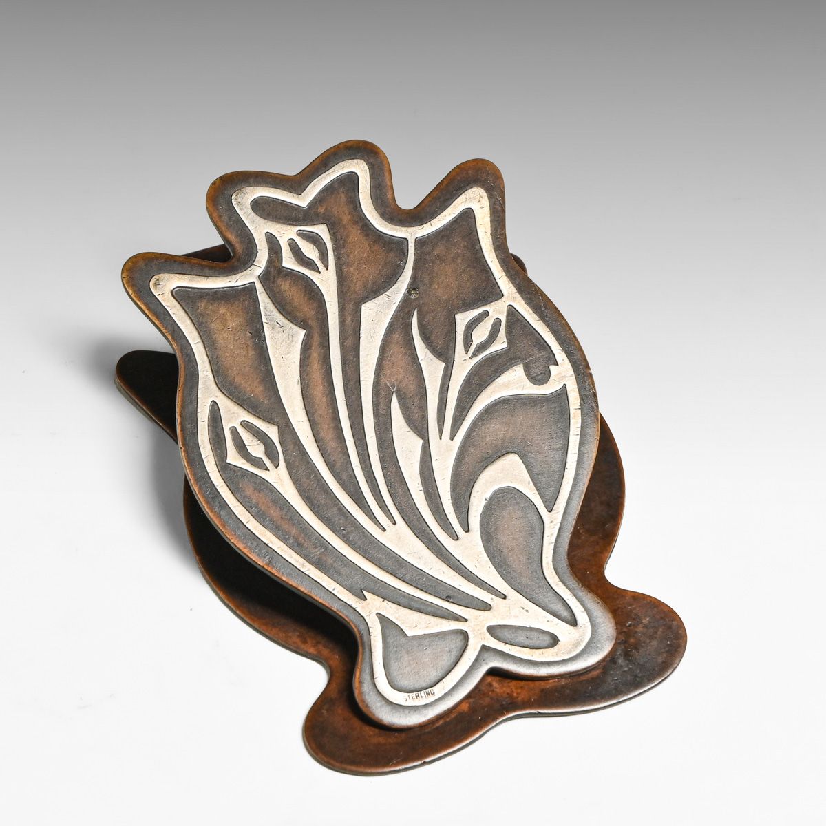 Early Heintz Sterling on Bronze Paper Clip c1910